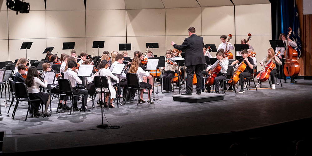  Students playing instruments 