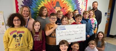 Compass FCU donates holiday funds to OCSD schools during “Month of Giving”