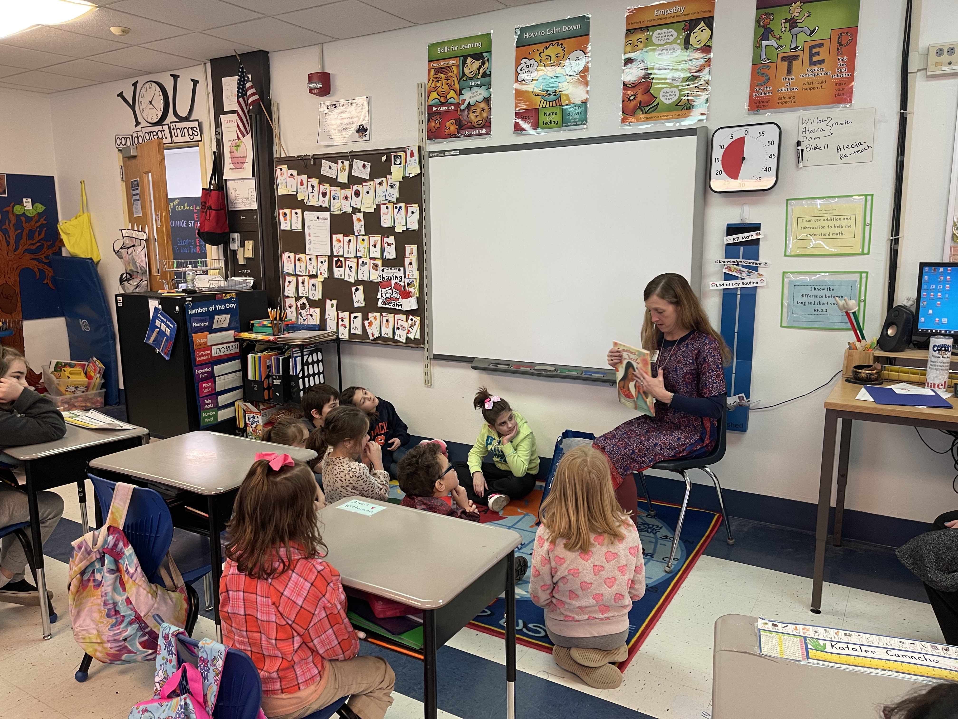 An OCSD teacher reads a book about agriculture to her class