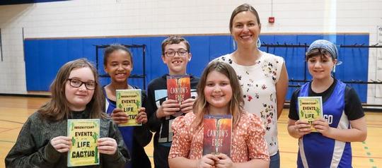 Award-winning author delivers presentation to OMS students